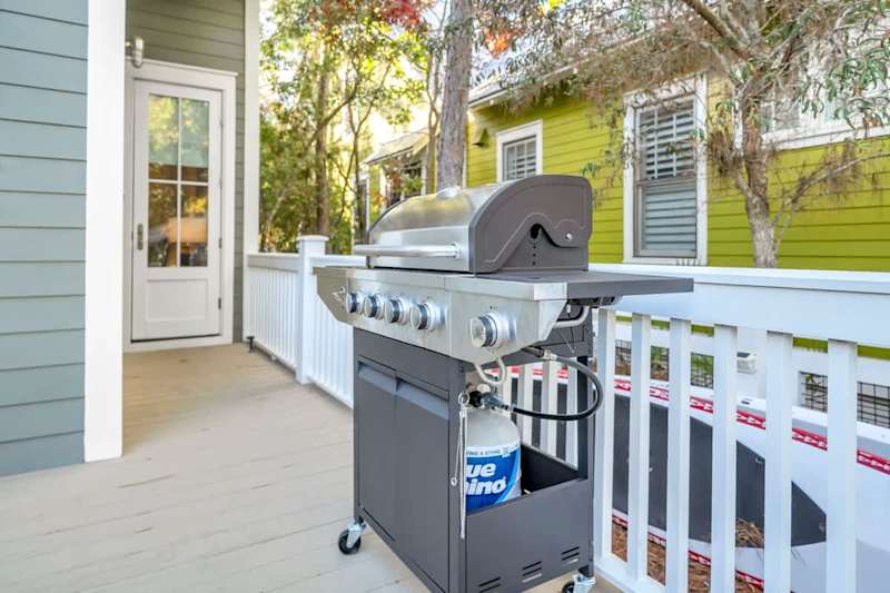 Enjoys cookouts by the pool with the gas grill.
