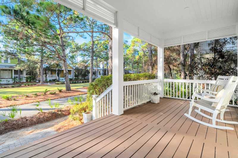 Front porch overlooks community green space.