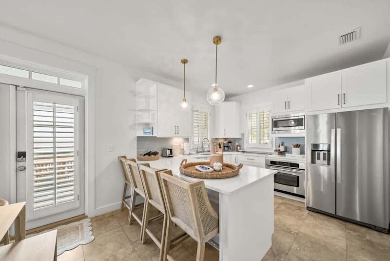 Kitchen island includes seating for 4.