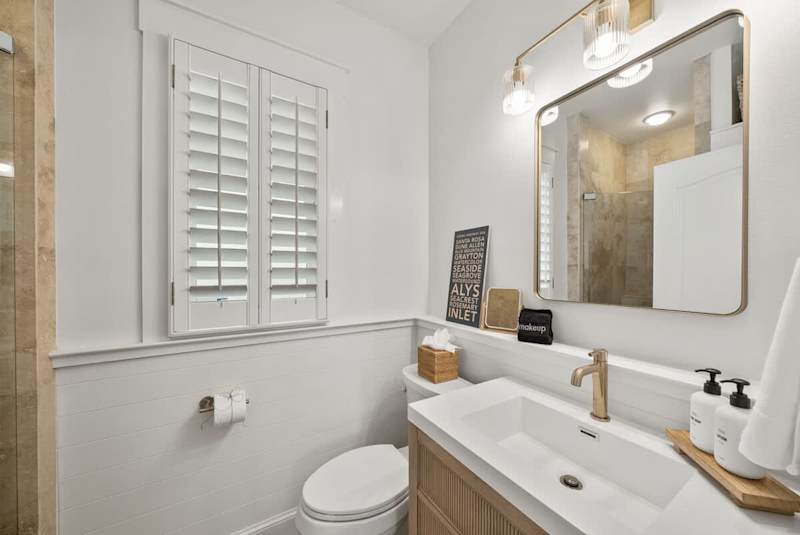 First floor bathroom features a walk-in shower.