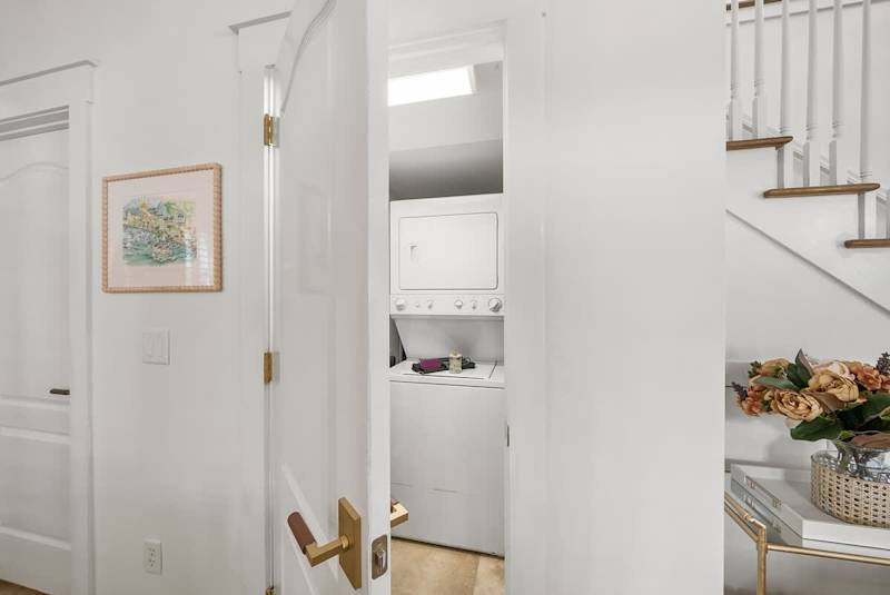 First floor laundry room features a wash and dryer.