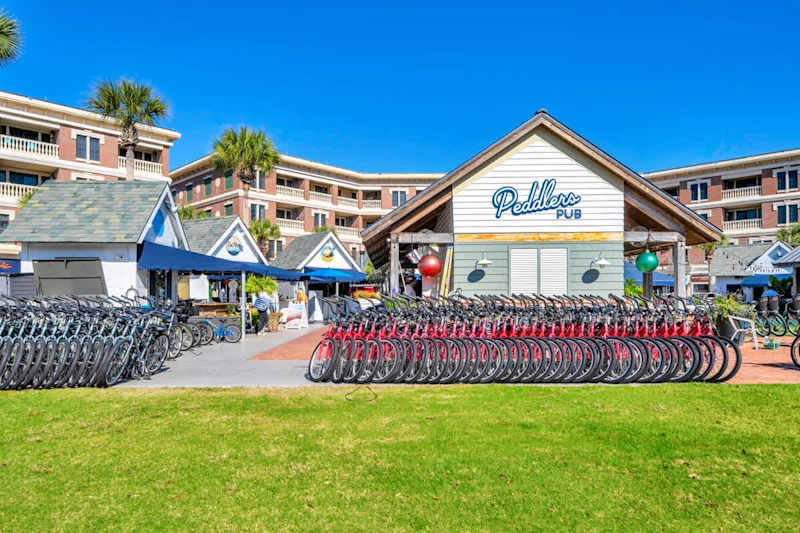 Peddler's Pavilion in front of the condo features bike rentals, local restaurants, ice cream, coffee, & groceries just steps away from the condo!