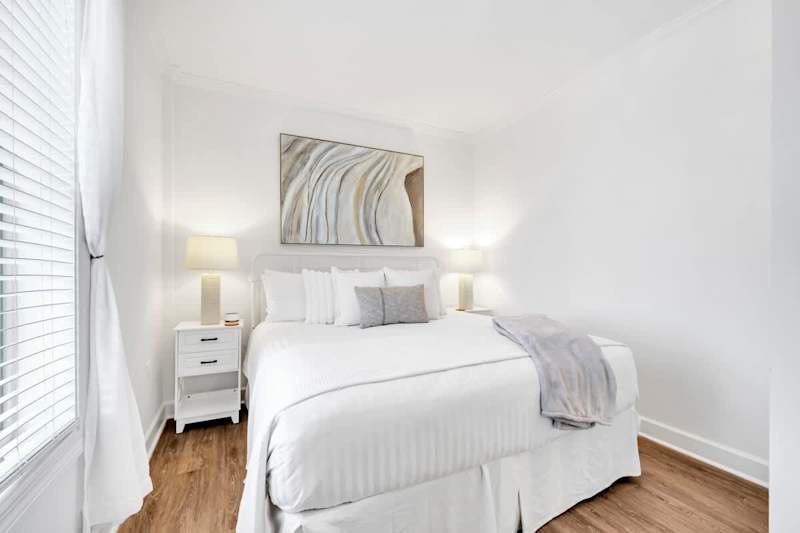 Studio features a cozy king bed.
