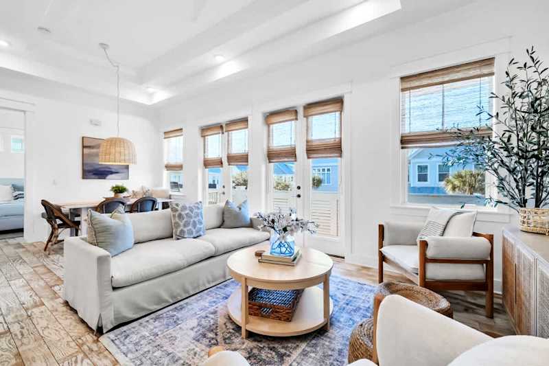Living room features a queen sleeper sofa.