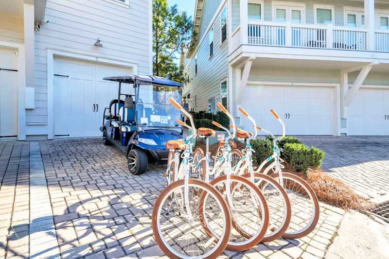 Home includes a 6-seater golf cart and four adult bikes.