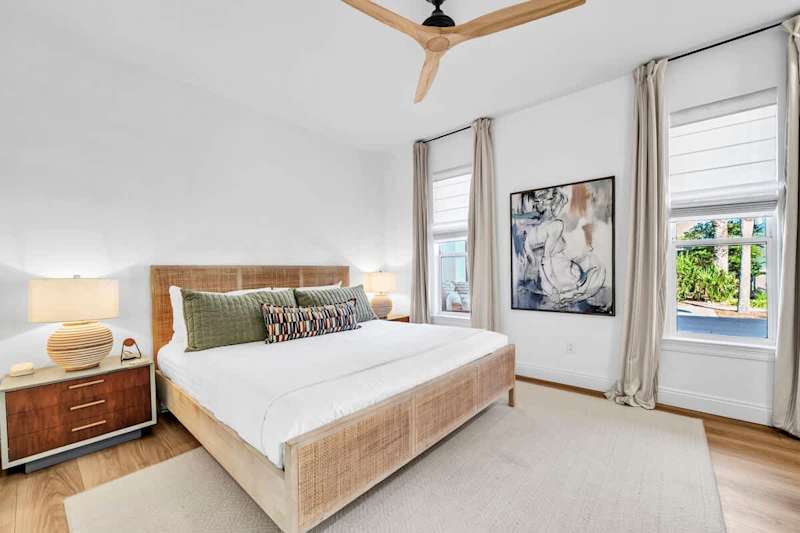 Bedroom #3 located on the first floor features a king bed and smart tv.