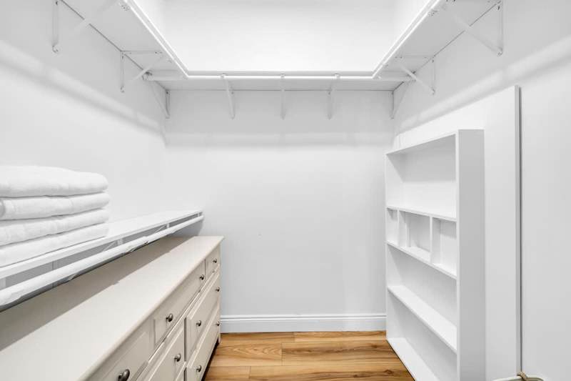 First floor includes a large walk-in closet.