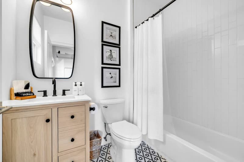 First floor hall bath #2 features a shower/tub combo.