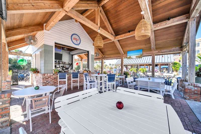Peddler's Pavilion in front of the condo features bike rentals, local restaurants, ice cream, coffee, & groceries just steps away from the condo!