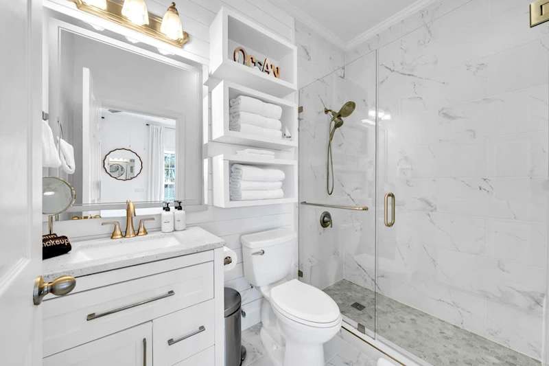 Bathroom features a walk-in shower.