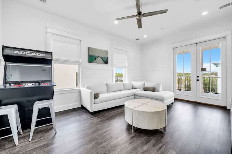 Game on! Third-floor living space with an arcade machine.