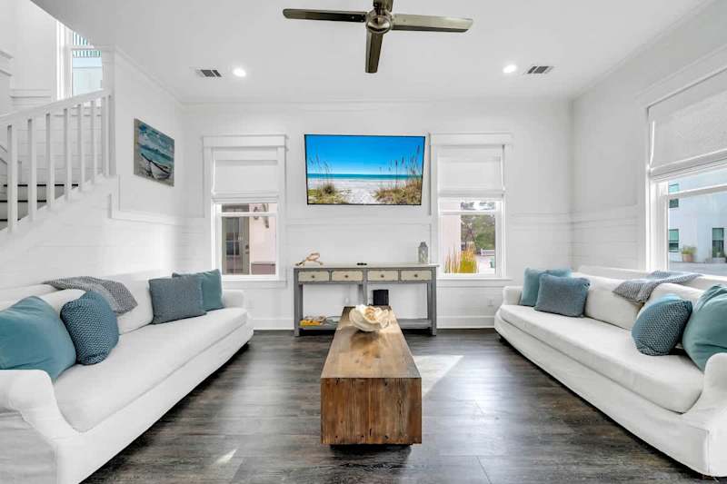 Living room features comfy seating and a Smart tv!