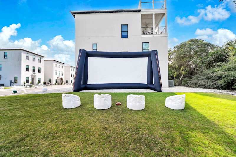 The green space leaves many opportunities for all day fun; movie nights, pick up football game, and more! **Movie projector available for additional cost.