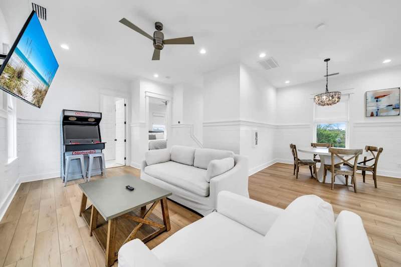 Game on! Third-floor living space with an arcade machine.