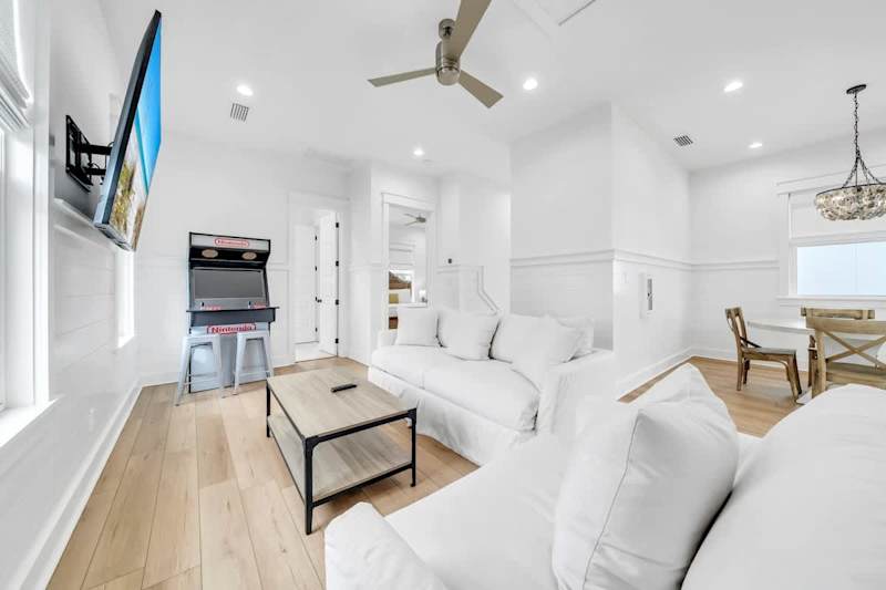 Game on! Third-floor living space with an arcade machine.