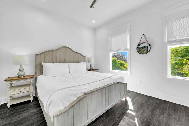 Bedroom #2 features an king ensuite, smart tv, and walk-in shower