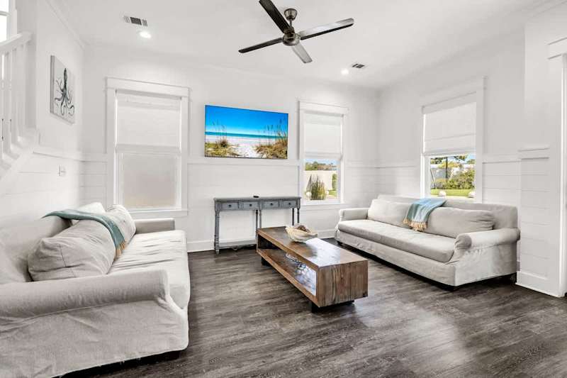 Living room features comfy seating and a Smart tv!