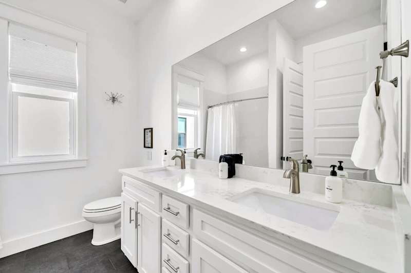 Second-floor shared bathroom with a shower + tub combo.