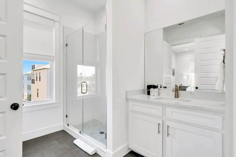 Third-floor shared bathroom with a walk-in shower.