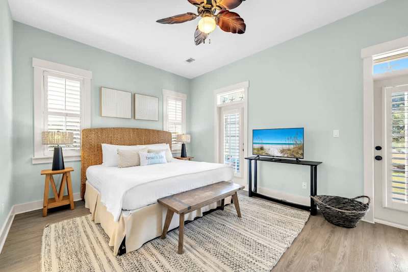 Bedroom #2 features a king, with ensuite and a smart tv.