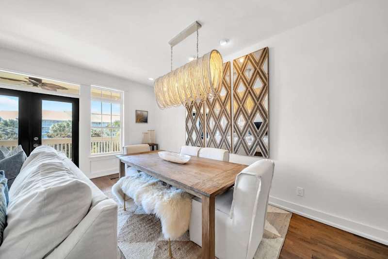 Dining room table includes seating for six.