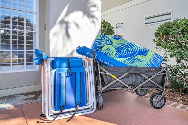 Beach gear is located in the bin outside on the porch.