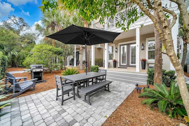Outdoor patio with seating, perfect for grilling out!