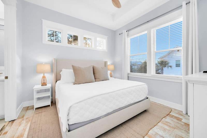 King bed in primary bedroom, with ensuite & walk-in closet.