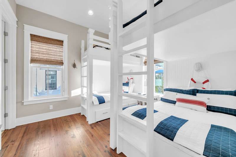 Bunk room features twin over twin bunk + full over full bunk with ensuite.