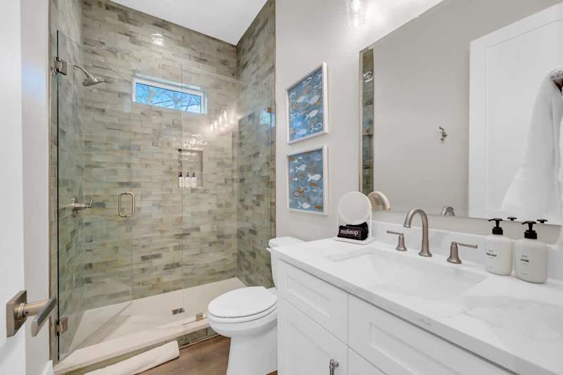 Carriage house bathroom features walk-in shower