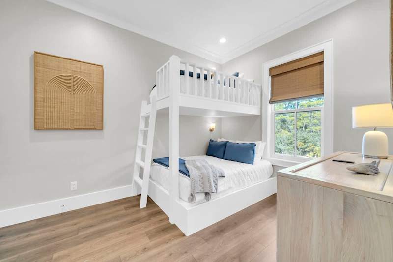 Bedroom #7 is in the carriage features a twin/full bunk and smart tv.