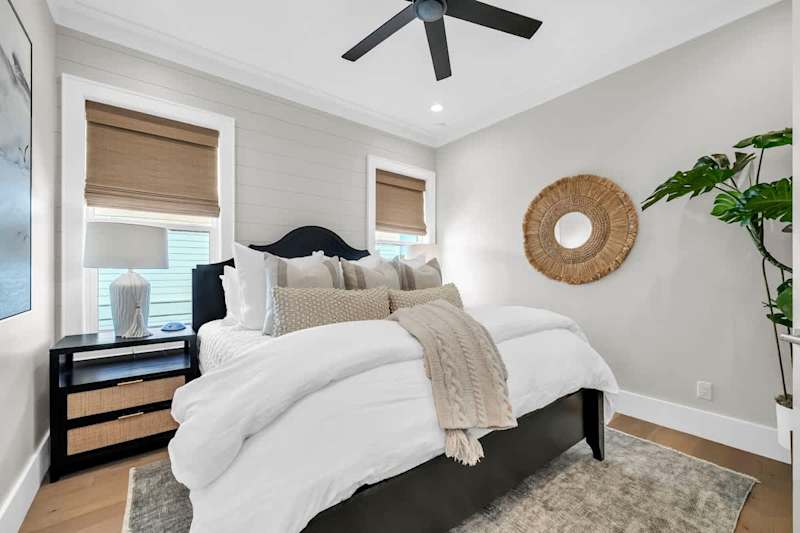 Bedroom #4 features a king bed, ensuite, and smart tv.