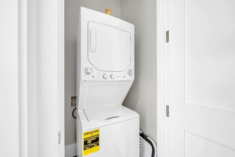Carriage house features a washer and dryer