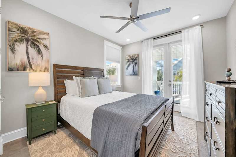Bedroom #4 features a queen with smart tv and access to private porch