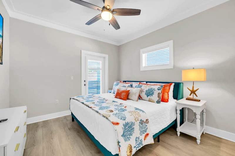 Bedroom #3 features a king with smart tv and porch access