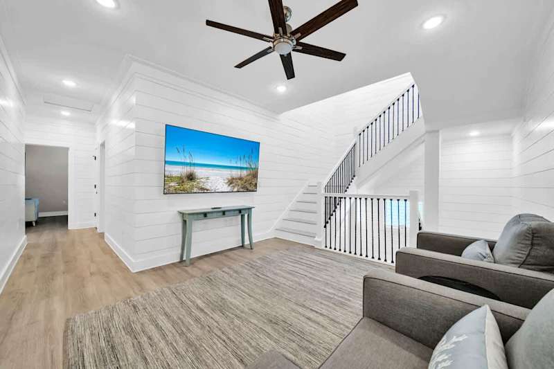 Second floor loft living area with tv perfect for movie nights!