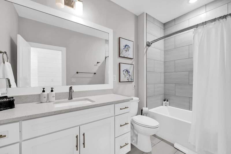 Second floor hall bathroom features shower/tub combo