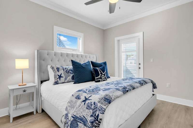 Bedroom #4 features a king with smart tv and porch access