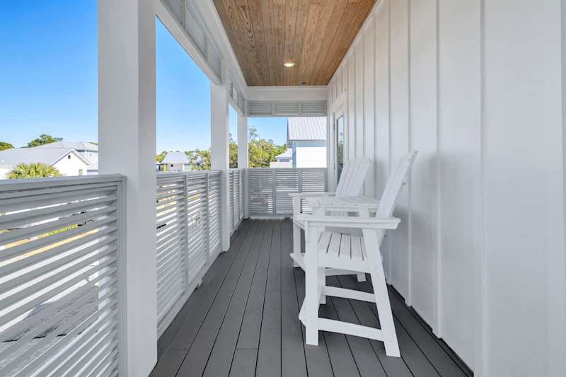 Private covered porch with outdoor seating