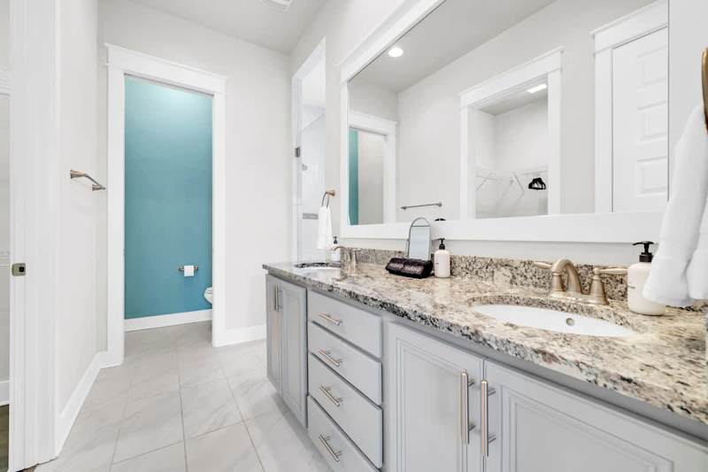 Primary bathroom features large walk-in shower