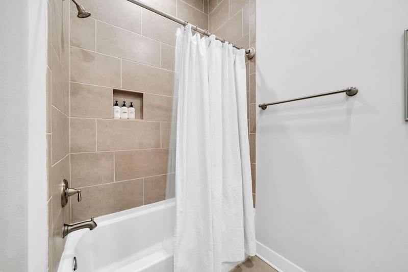Second floor hallway bathroom features a shower/tub combo.