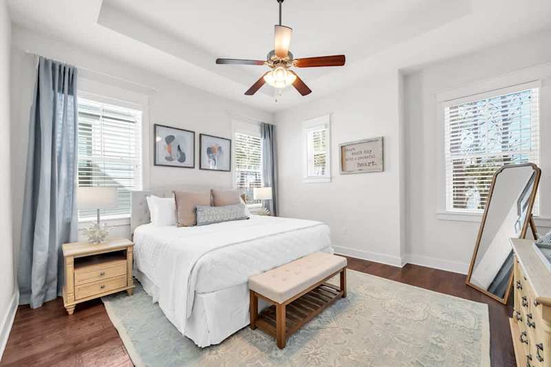 Bedroom #3 features a king bed, ensuite, and smart tv.