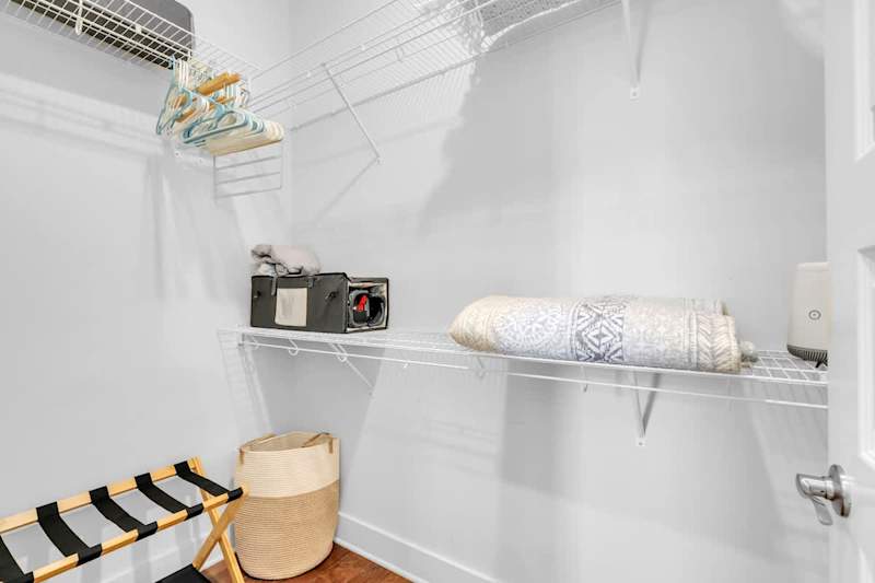 Bedroom features a large walk-in closet.