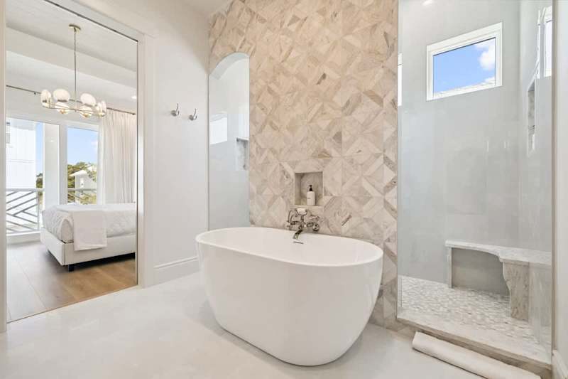Master Bedroom features a soaking tub + walk-in shower ensuite