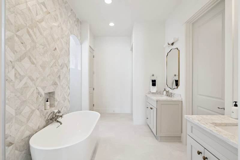 Ensuite features a Soaking Tub + Walk-In Shower