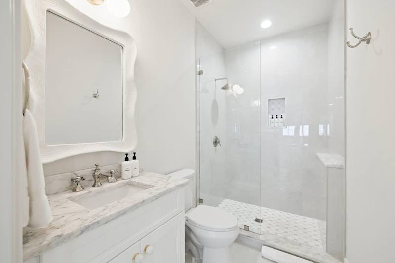 Third floor bathroom featuring walk-in shower