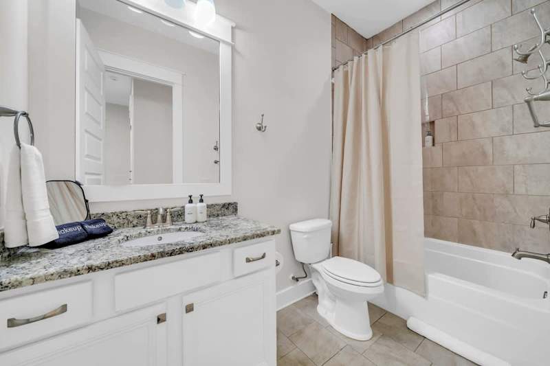 Second floor hallway bathroom features a tub/shower combo.