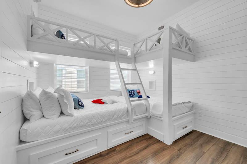 Bedroom #2 features twin over twin + twin over full bunk beds and a smart tv.