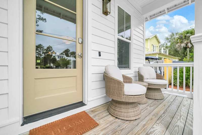 Front porch seating perfect for morning coffee!