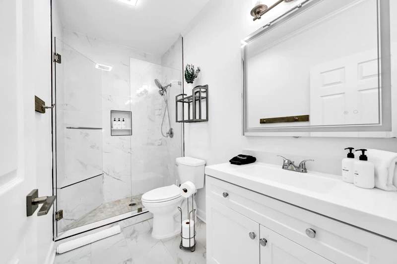 Bathroom features a walk-in shower.